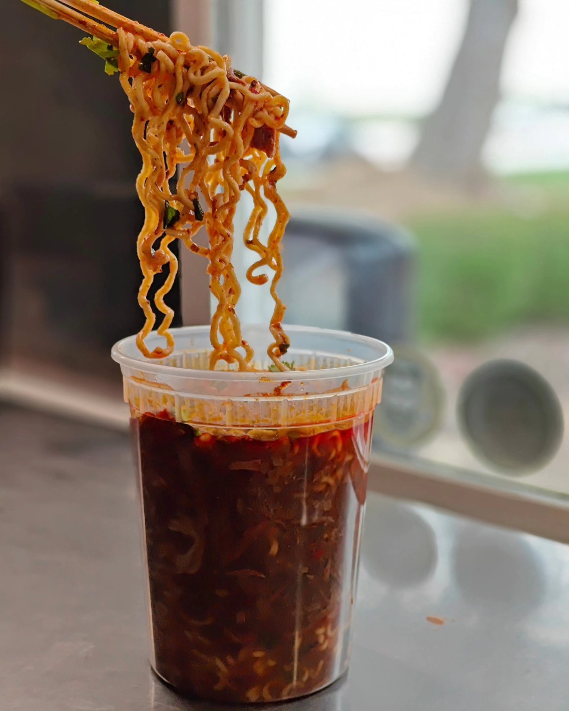 Noodles with dark sauce