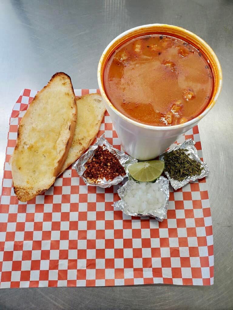 Toasted bread with a cup of soup